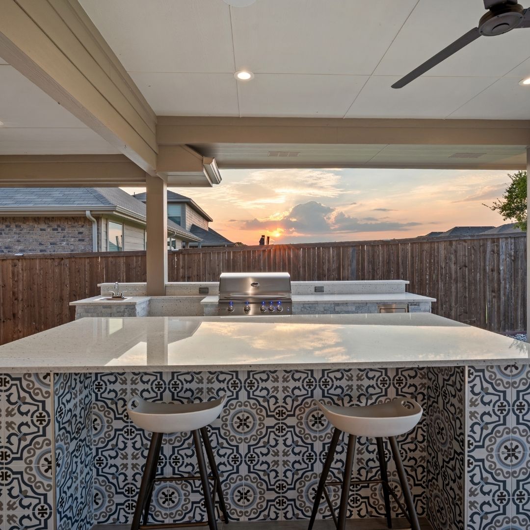 Outdoor kitchen overlooking a sunset.