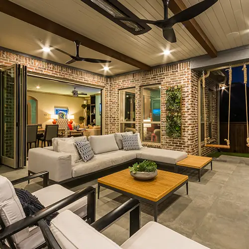 Outdoor living patio with fireplace and seating