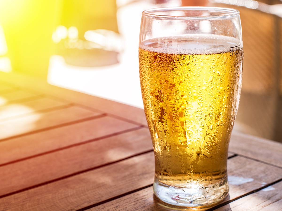 Beer sitting on a table outdoors