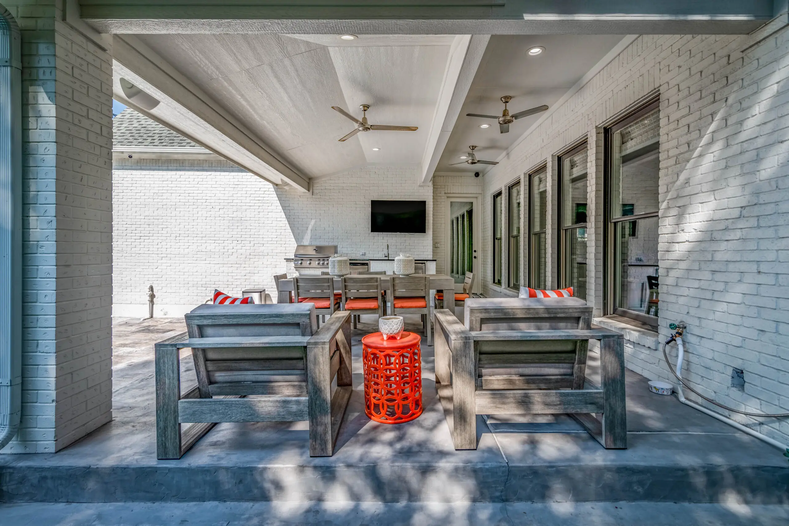 Luxury outdoor living space with pool and patio