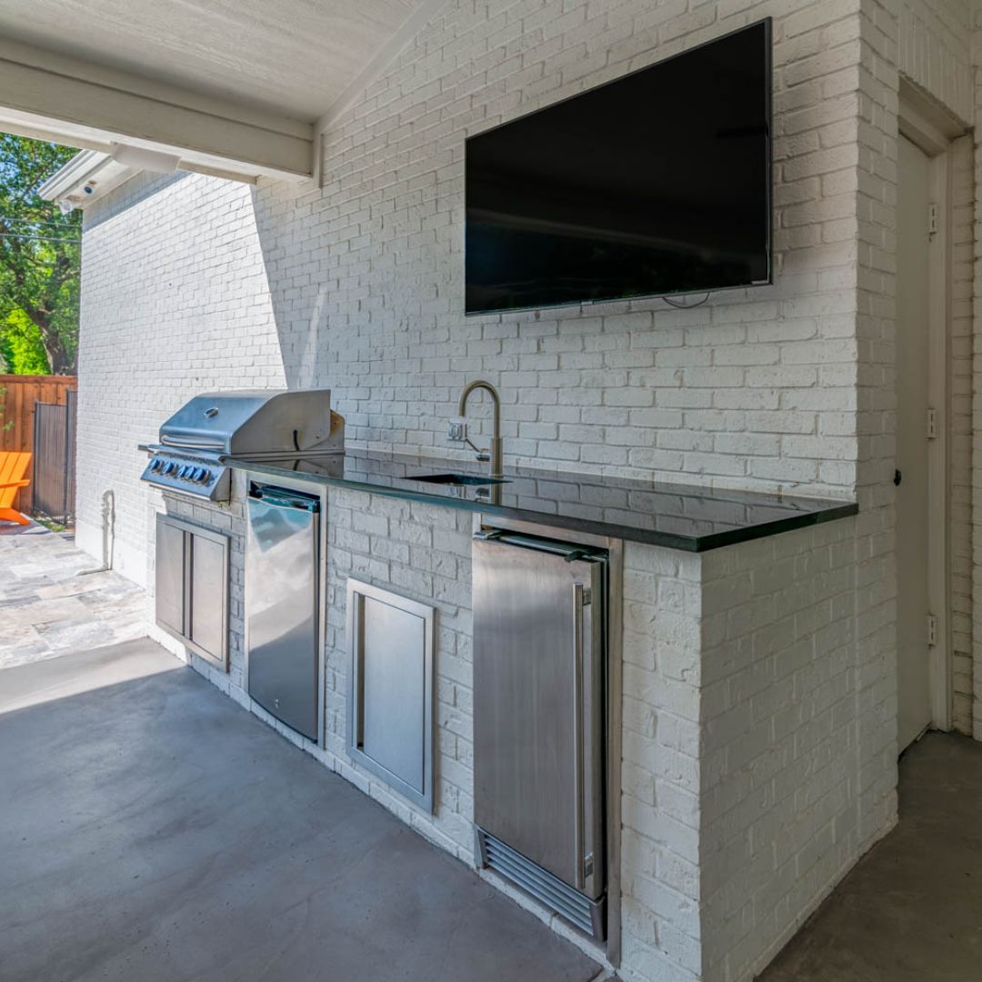 stainless steel appliances in an outdoor kitchen
