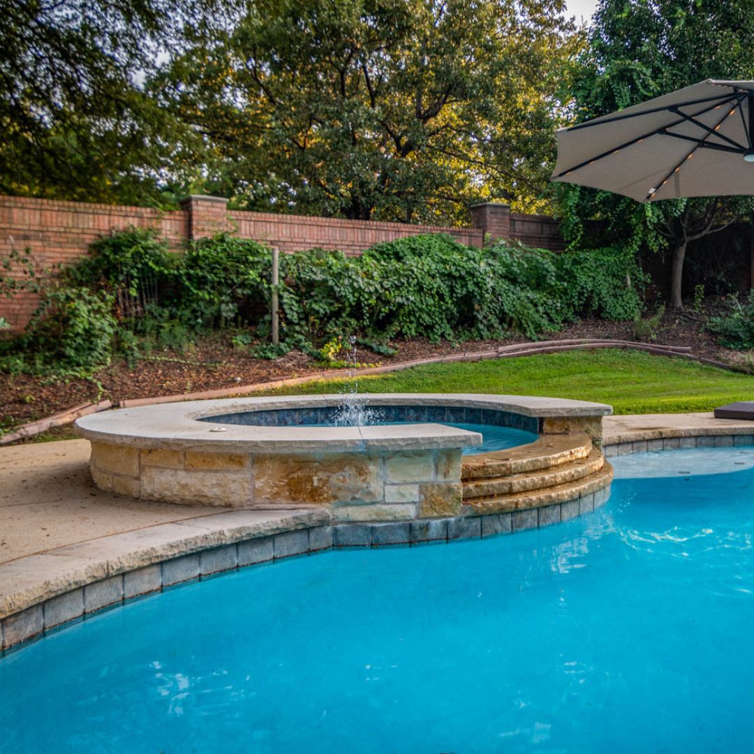 pool with hot tub connected