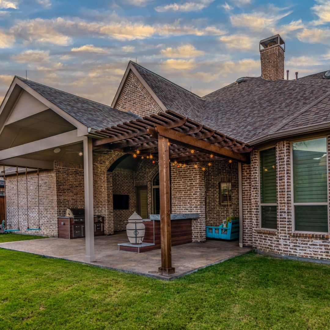 A hand-built pergola attached to a patio
