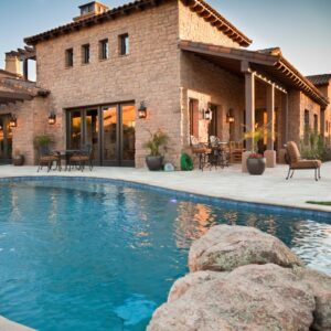 backyard pool with natural rock