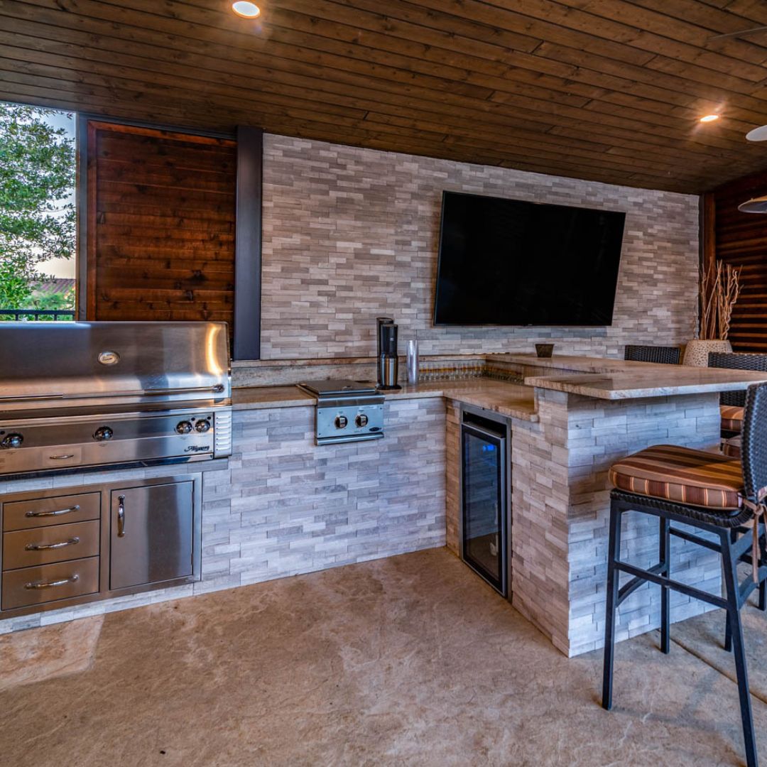 a outdoor kitchen that matches the vibe of the client