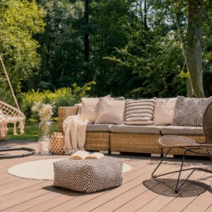 Boho looking outdoor living space with nice couch on patio