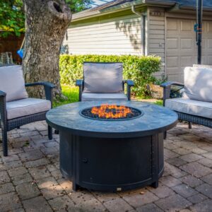 Chairs surrounding outdoor fire pit