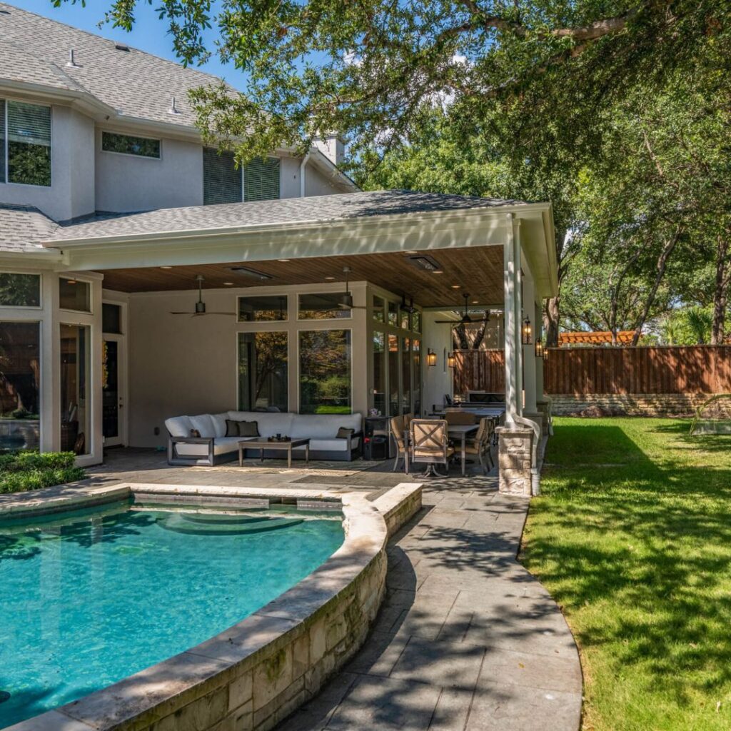 An outdoor area next to a pool