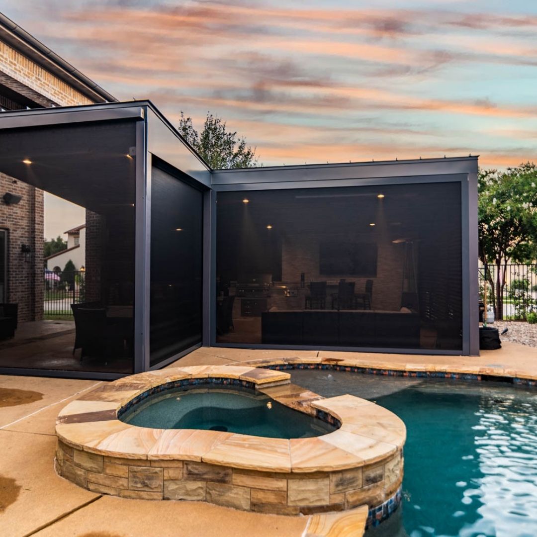 backyard oasis with a sunroom and pool