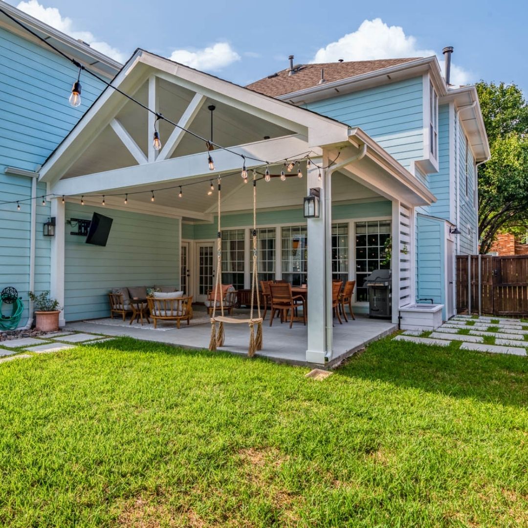 backyard retreat with lights around the patio