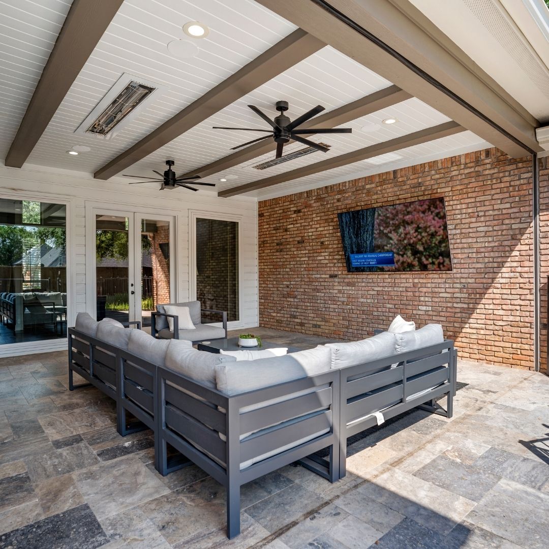 comfortable patio furniture with outdoor TV