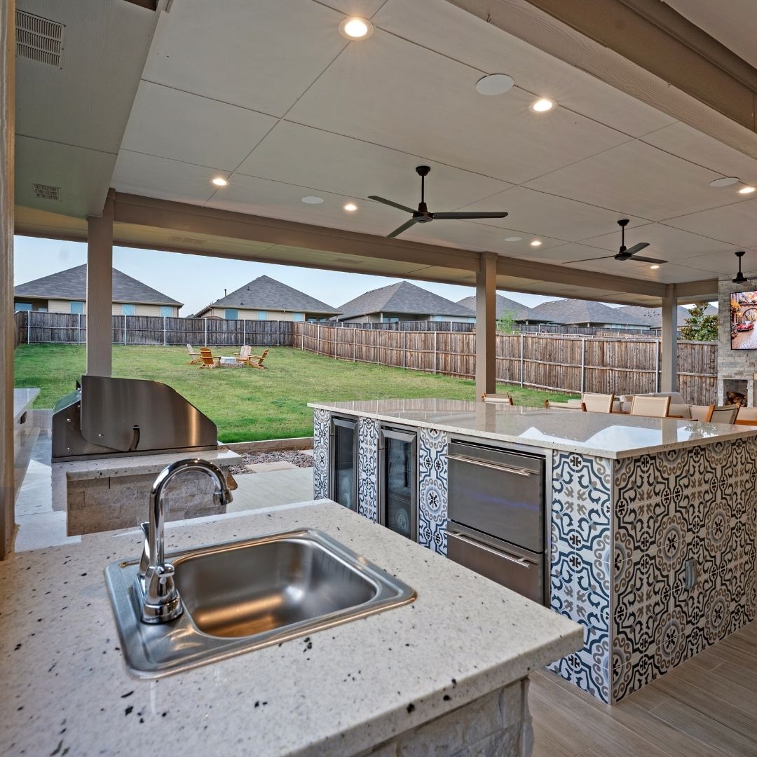 prep sink and large island with range