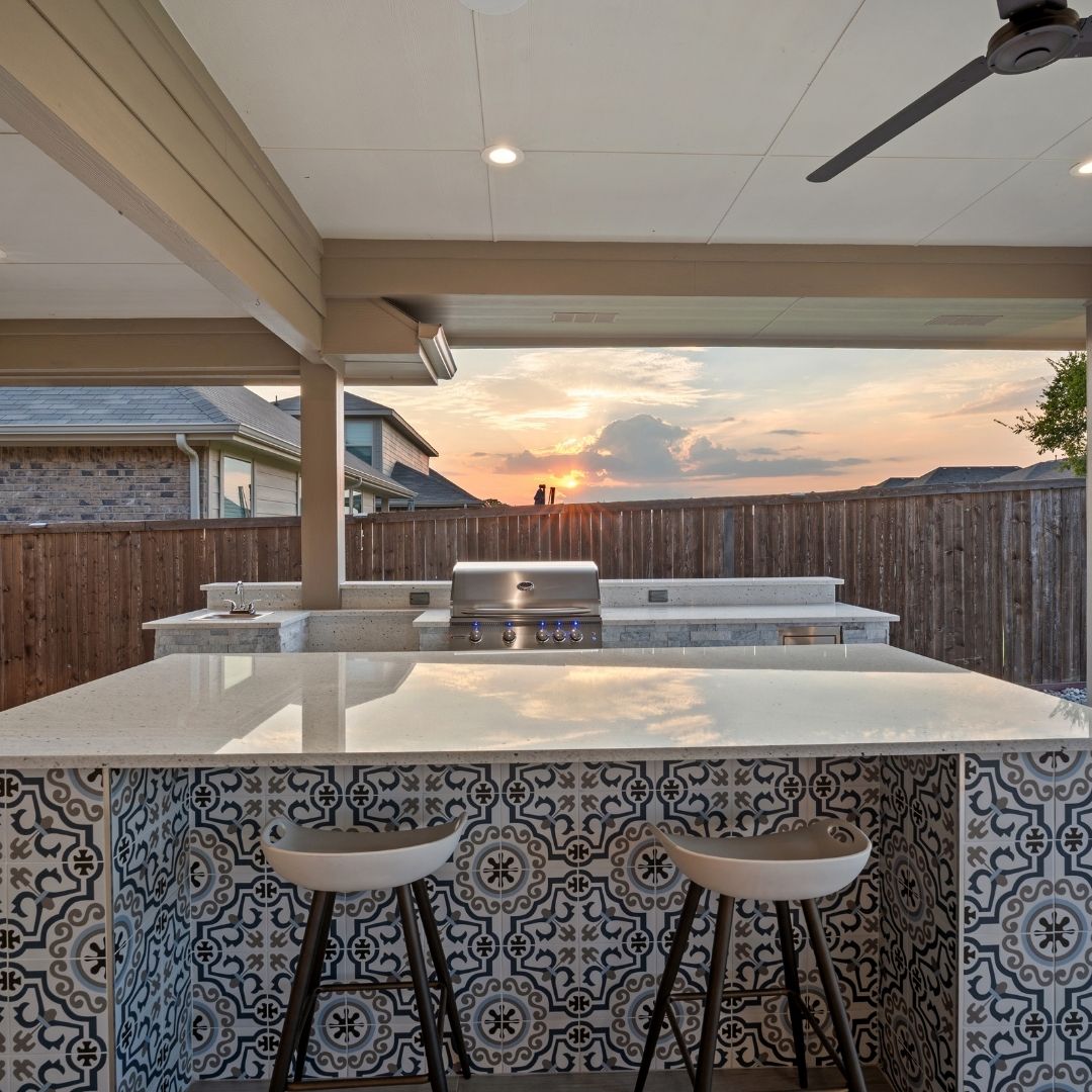 outdoor kitchen with island seating